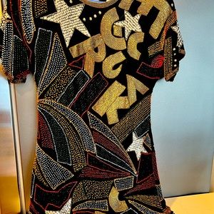 100 percent silk medium sequined dress.